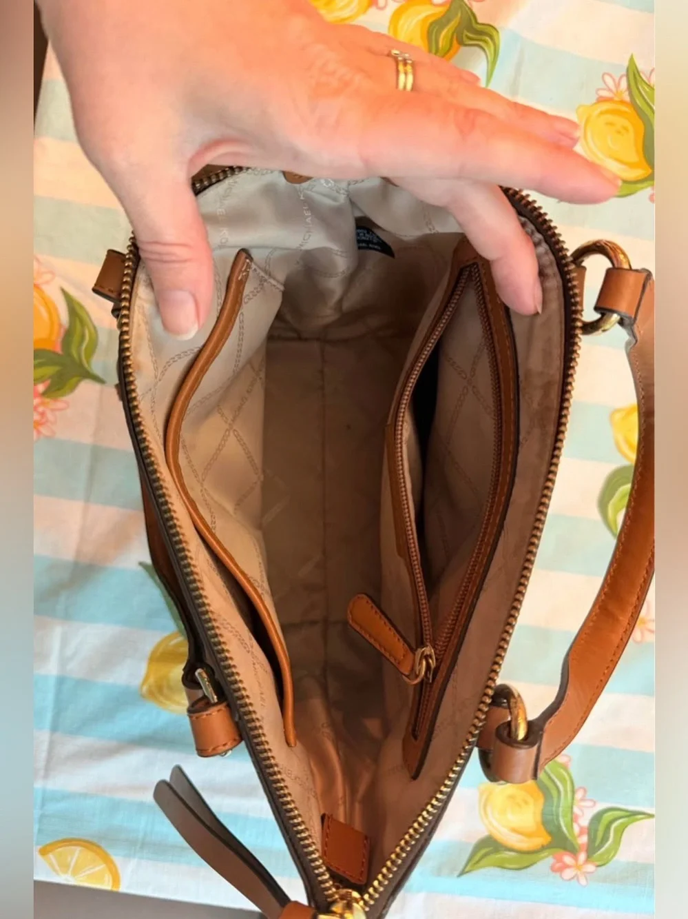 Michael Kors purse with matching wallet.